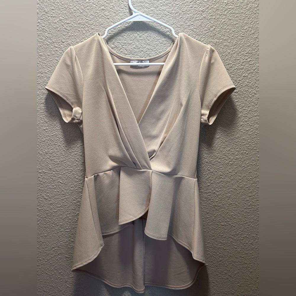 A Kiss N’Tell Boutique shirt! That’s is perfect for your business casual events!